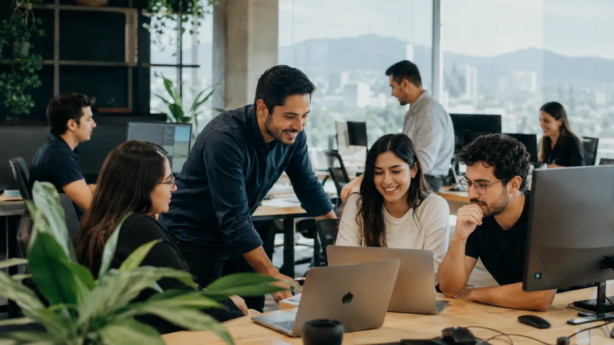 Tech professionals collaborating in a Guadalajara startup office