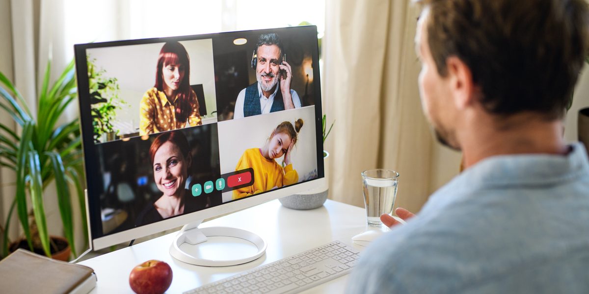 Businessman with laptop working indoors in home office, business call concept. tendências de RH para 2024